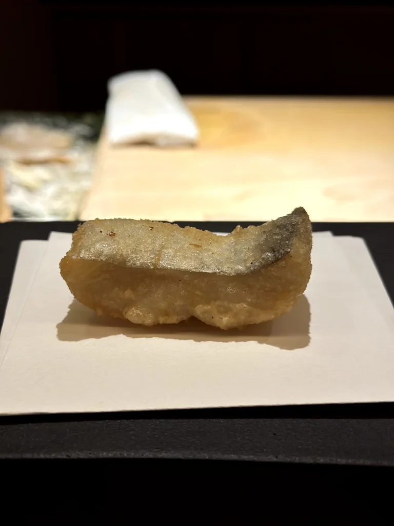 Silverbelt fish tempura with a light golden batter, showcasing the fish’s delicate texture and flavor.
